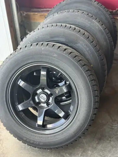 18” studded winter tires and rims. Bolt pattern 5 x 114.3mm. Like new, only 4000kms driven.
