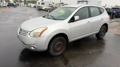 This silver Nissan Rogue S is a reliable pre-owned SUV perfect for city commuting or weekend adventu...