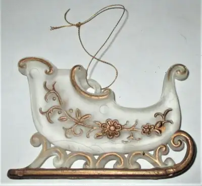 Vintage Christmas Ornament Sleigh Clear Body with Golden Painting It is under very good vintage cond...