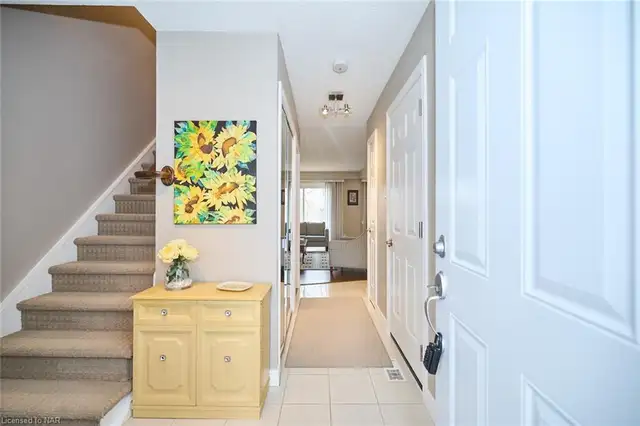 3 Beds,2 Bath,Finished Basement,Appliances,A.C.Garage.Patio,Town