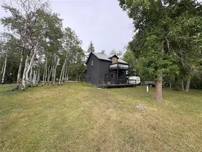 Here is your opportunity to own this strong built cabin with huge potential located only a few house...