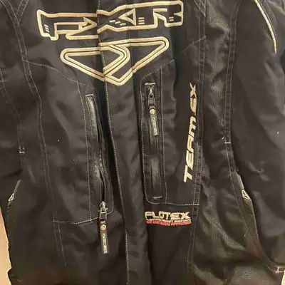 This is a pre-owned FXR Team EX Jacket designed for women, perfect for motorcycle enthusiasts seekin...