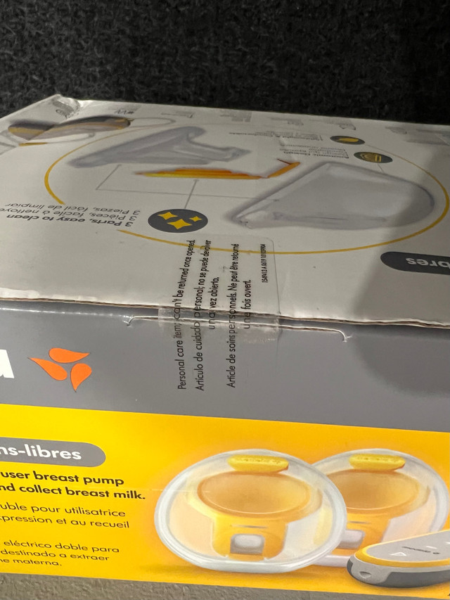 Medela freestyle hands free double electric breast pump. New