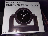 Suntone dessiner swivel clock/horloge 