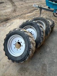 Skid Steer Rims and Tires 10x16.5”