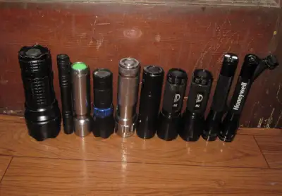 $80 for Collection of 10 flashlights, all work but don't come with batteries. The 2 Maglites are tra...