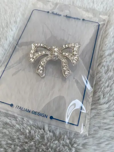 Crystal element Brooches, View more