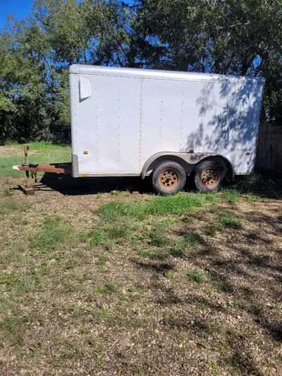 12 ft. X 6 ft. Enclosed cargo trailer with rear ramp door. $5000 or best offer. Call or text 306-540...