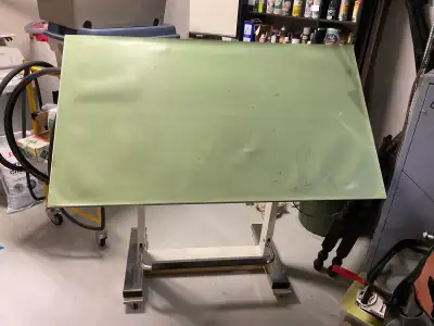 Drafting/art board. This is a quality mechanical table featuring a foot release arm for raising/lowe...