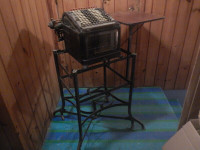 ANTIQUE ACCOUNTING ADDING MACHINE WITH GLASS SIDES AND STAND,