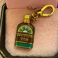 Vintage Juicy couture tanning bronzer charm