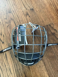 Brand  New Bauer oval face guard.
