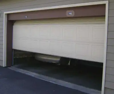 Spring and Cable adjustment and general maintenance for Overhead Garage Doors. $100 flat rate (assum...