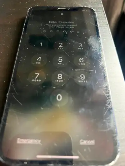Damaged and locked black iPhone 12 for parts only, View more