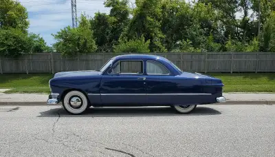 1950 Ford Business Coupe. V8 flathead, 3 on the tree, original BC car, lowered correctly, paint good...