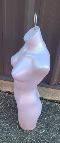 Plastic woman's torso display mannequin. 