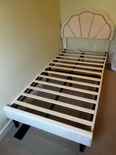 Gently used bedframe (only a year old). Paid over $600. The headboard lights up with 9 different col...