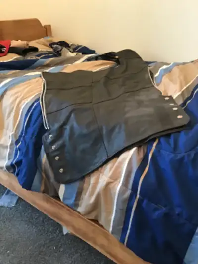 Men’s chaps size XL ($100), in great condition.