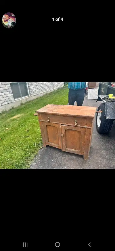 This is an antique wash stand, perfect for adding a touch of rustic charm to your home! It features...