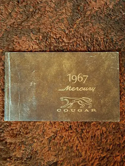 This is a vintage 1967 Mercury Cougar owner's manual, a piece of automotive history ready to guide y...
