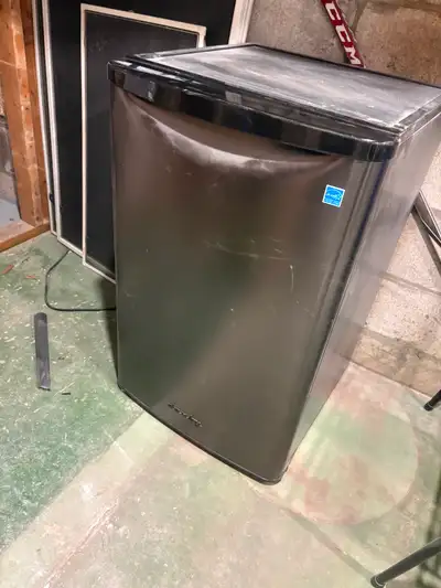 Danby mini fridge in working order. Upgraded to a bigger fridge.