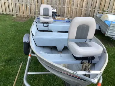 Aluminum Boat in very good condition deep hull, 56” wide. 4.5 hp Evinrude runs excellent. Trailer is...
