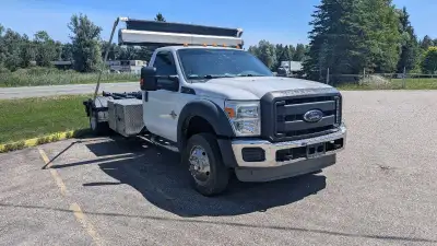 2013 roll off bin truck No roll off bin with truck Hydraulics cylinders clean and hydraulics work. U...