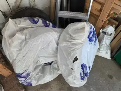 Selling a complete set of 4 Uniroyal Tiger Paw Ice & Snow winter tires mounted on heavy-duty steel r...
