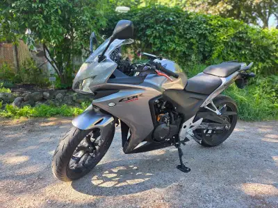 2015 Honda CBR for sale. Low KMS. Bought it to ride with my GF, but she's a rider...I am not. Well m...