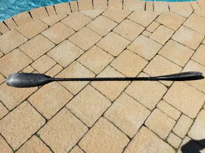 A TurboStrength fiberglass kayak paddle.