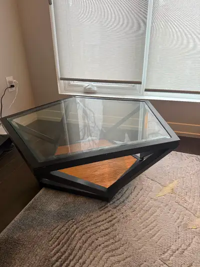 Beautiful teak pentagon coffee table from urban barn - $50, View more