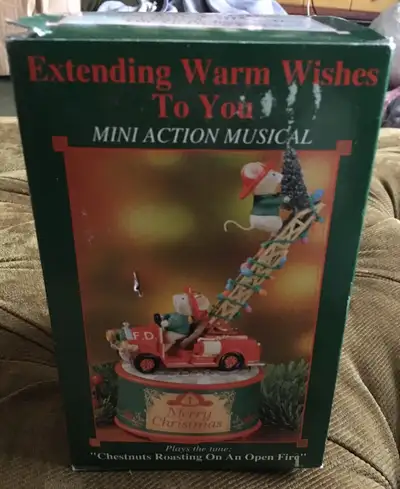 This is for a 1994 ENESCO Extended Warm Wishes Christmas mice on fire truck music box. It is a mini...