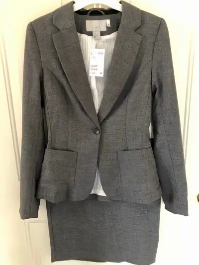 Grey H&M jacket and matching skirt, View more