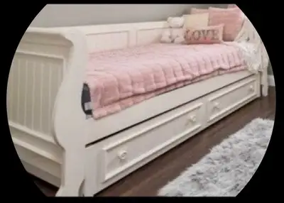 - gently used in my office as a daybed - trundle used to store extra linen - bed has a slat foundati...