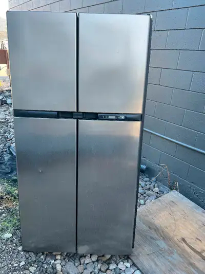 Largest of RV Fridges at 18 cubic Very good Condition Dimensions. H 69" x W 36 " x D 24" Propane and...