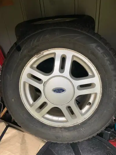 Used one winter. Sell with rims. Certified wintertek. 230/60R16. 5 hole alloy rims. Fits freestar va...