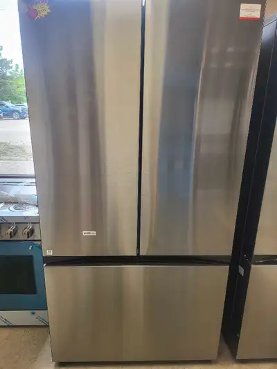 This is a 36-inch Samsung French door refrigerator featuring a stainless steel finish and a spacious...