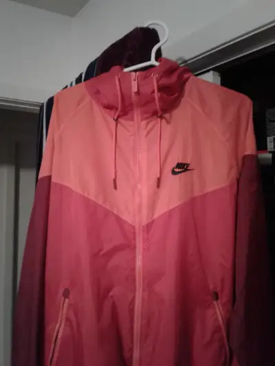 Nike windrunner price is $30.00 firm on price. Wore it once, been sitting in closet for 5 years. Siz...