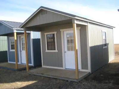 SALE 5% OFF! BRAND NEW 10x20 Cabin/Shed Front deck/porch, walk in door and three windows. Awesome ga...