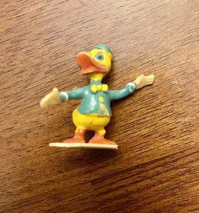 Approximately 3” tall. Hard plastic. I believe from 1967-1971. If anyone knows the history of this f...