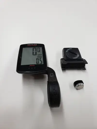 Fairly new Cateye Padrone wireless bike computer with optional mounting bracket. The computer is abo...