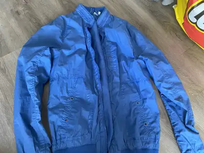 Like new blue wind breaker - men’s size small
, View more