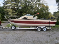 1990 24 ft. Aluminum Crestliner Sabre with trailer