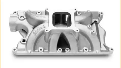 Single plane Victor Jr intake manifold for a Ford 351W. Low-profile, single-plane Edelbrock Victor J...