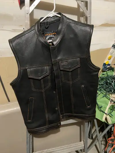 Worn once for about 20 minutes still brand new paid over $300 for it. Has orange stitching very nice...