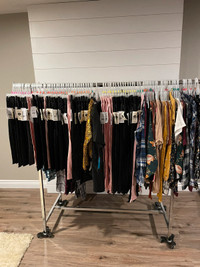 Rack of Womens and girls clothes