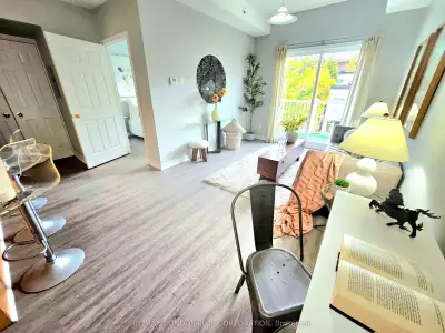 This 1-bedroom condo townhouse features a walk-up upper-level layout designed for privacy and light....