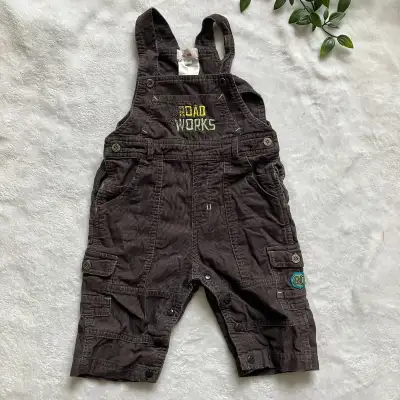 Baby overalls, size 6 months. Brown corduroy with "Road Works" embroidered design. Adjustable straps...