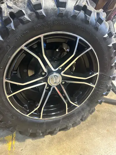 Cfmoto rims and tires. 26/9r14 and 26/11r14 set of tires and rim. Rims are 4x110 bolt pattern. Lots...