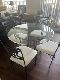 Glass top table and 4 chairs 